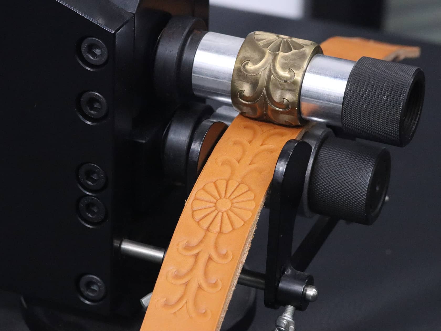 Leather belt roller embossing machine